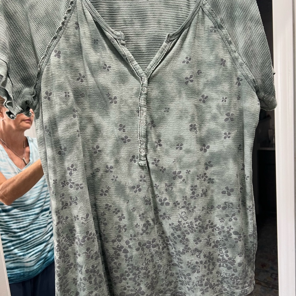 Democracy Sage Green Short Sleeve Henley with Dark Floral Accents